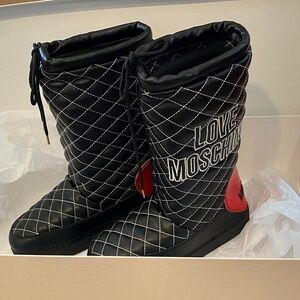 Authentic Love Moschino Black Quilted Boots with Red heel heart Accent.